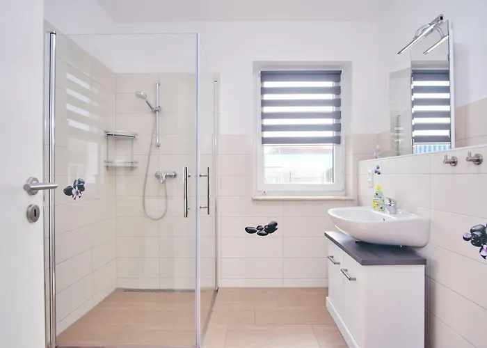 Апартаменты Meerblick Haushaelfte *